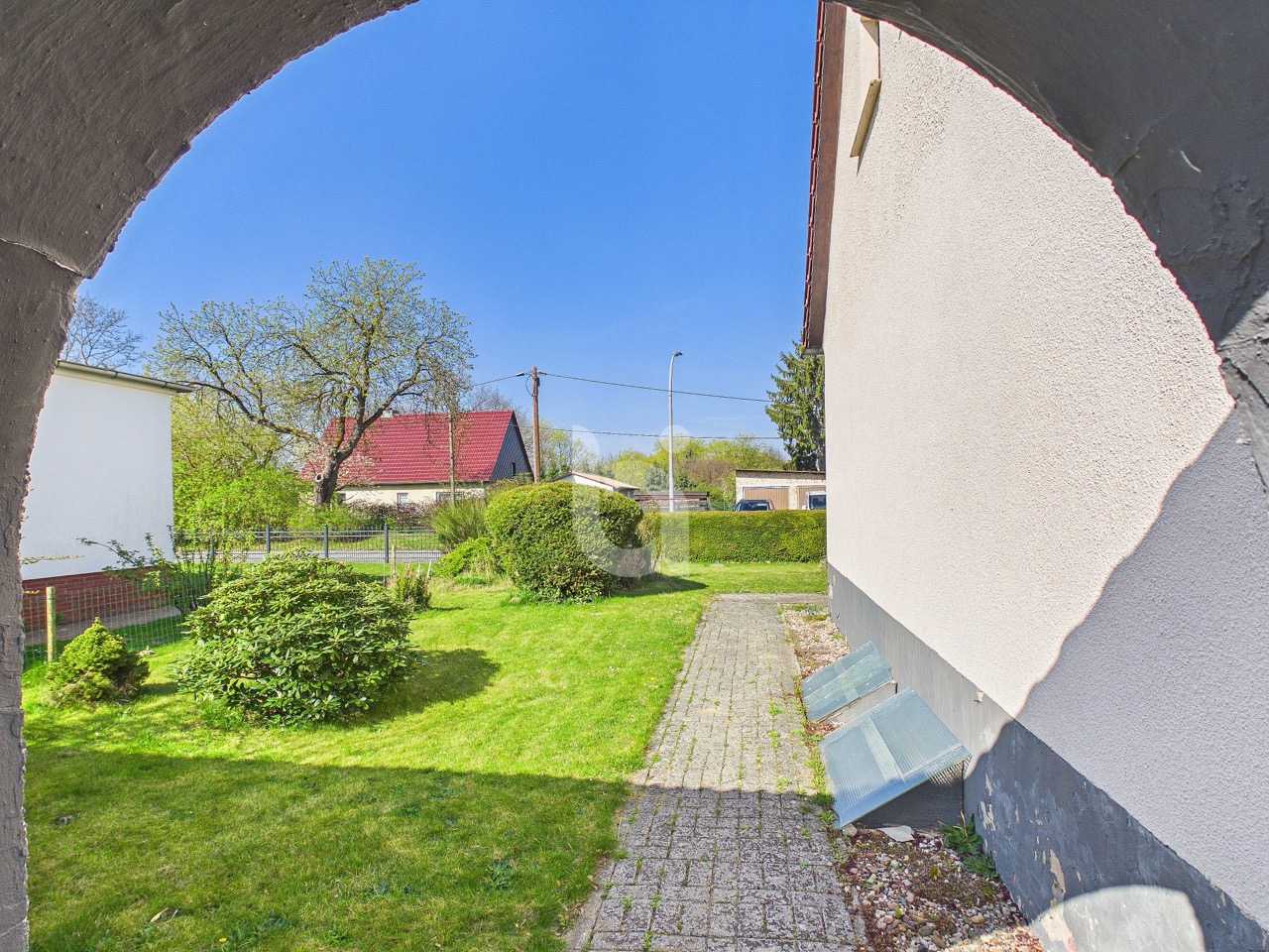 Grünareal Toreingang