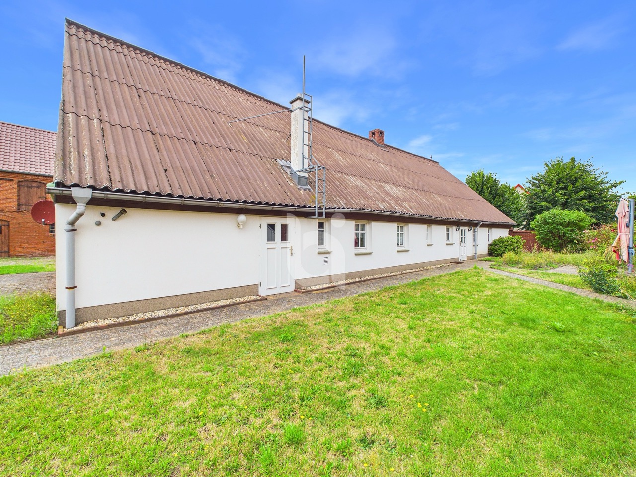 Grünbereich:Hausrückseite